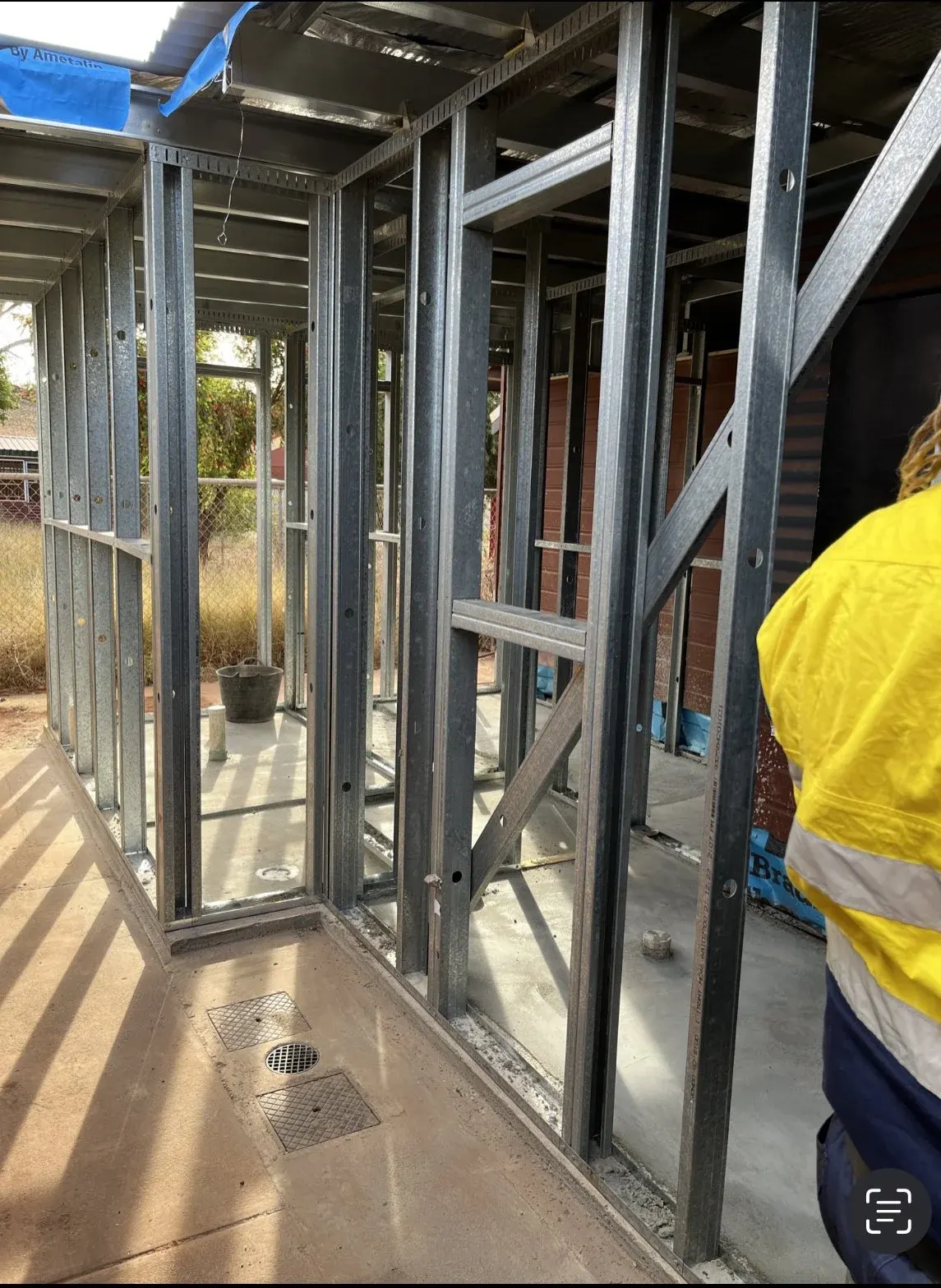 Electrician working on a new steel-framed building