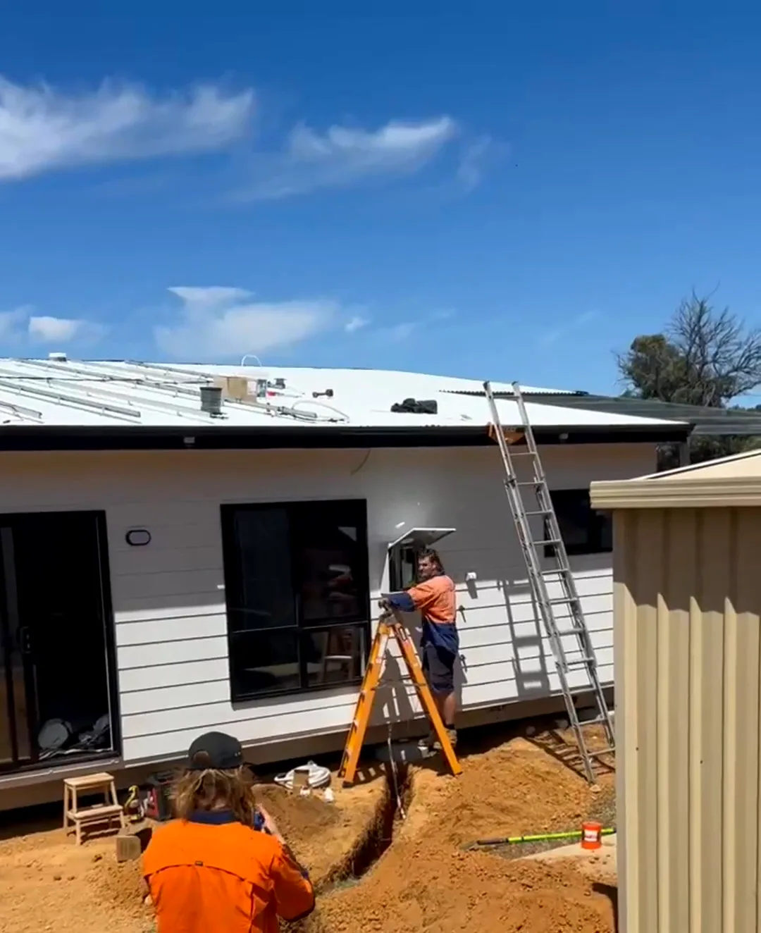Infinity crew trenching and installing an off-grid Sigenergy system at a rural home
