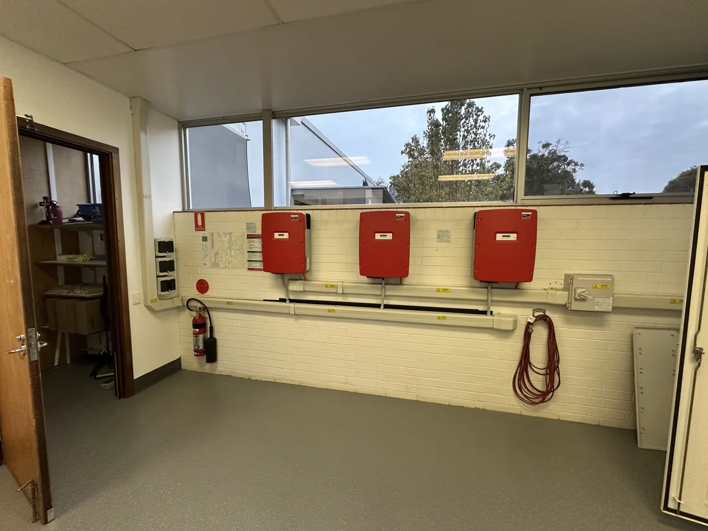 Inverter room with new Fronius inverters at a metropolitan cemetery